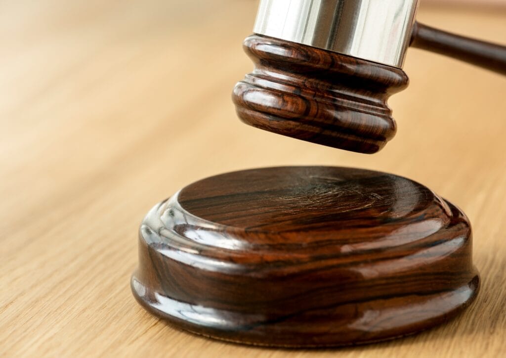 Closeup of a judge's gavel. For our blog about Effectively Recovering Court-Ordered Debts in Virginia