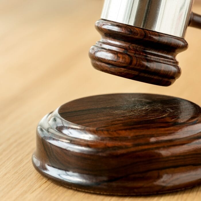 Closeup of a judge's gavel. For our blog about Effectively Recovering Court-Ordered Debts in Virginia